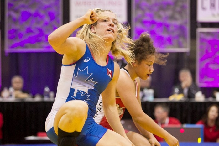 Danielle Lappage reacts after defeating Braxton Stone during their first match.