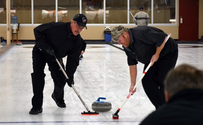 The Innisfail Curling Club recently held its annual Men&#8217;s Bonspiel Dec. 4 to 6. Members of the Innisfail Curling Club are seen here practising the sport during a