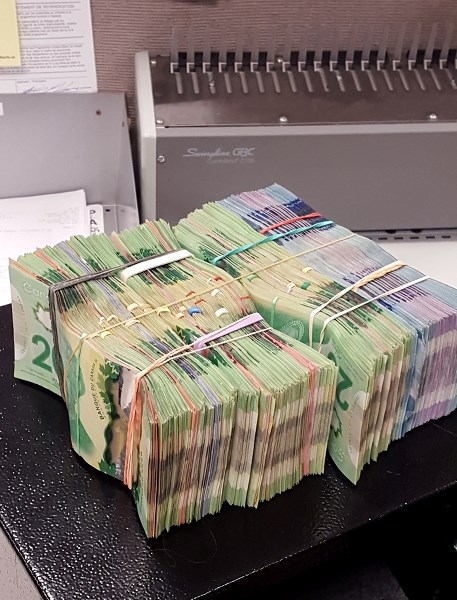 Innisfail RCMP seized $35,000 from a Calgary man and his vehicle in Innisfail on Dec. 14. Mounties also discovered 46 fentanyl pills.