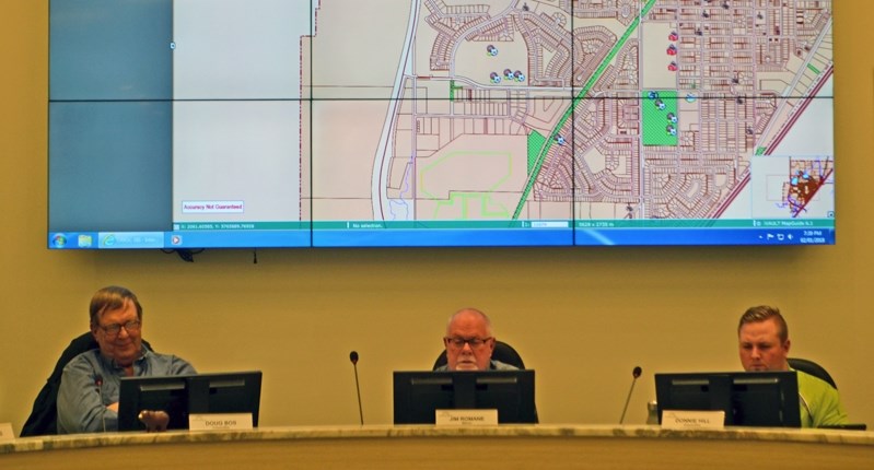 Members of town council ponder information from a housing stock presentation that was delivered to them at an Agenda and Priorities Meeting on Jan. 2.