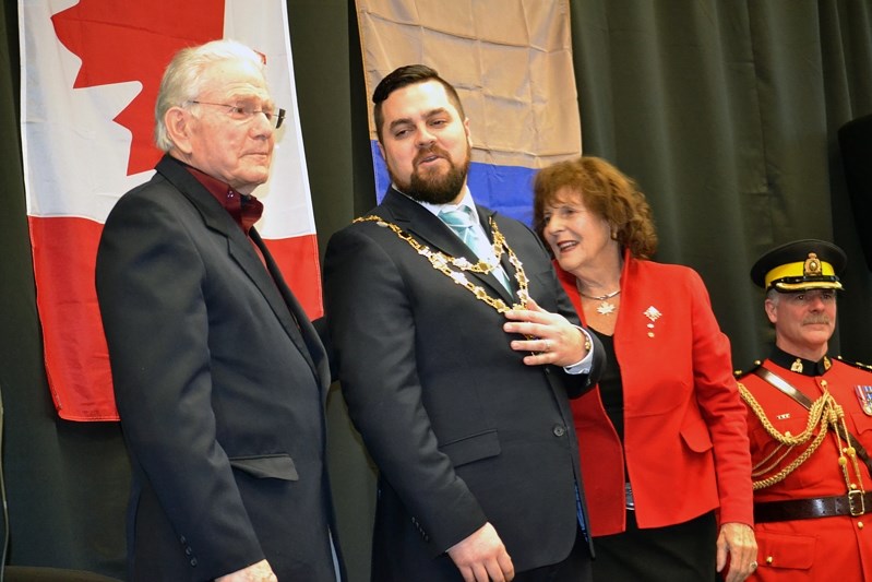 Penhold mayor Mike Yargeau with the new Chain of Office that was presented by Stewart Ford and Alberta Lt.-Gov. Lois Mitchell.