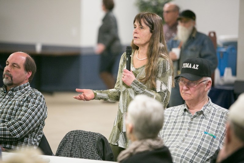 Gayle Langford gives comments and suggestions during the question-and- answer period at the Rural Crime Town Hall meeting in Innisfail on Jan. 27.