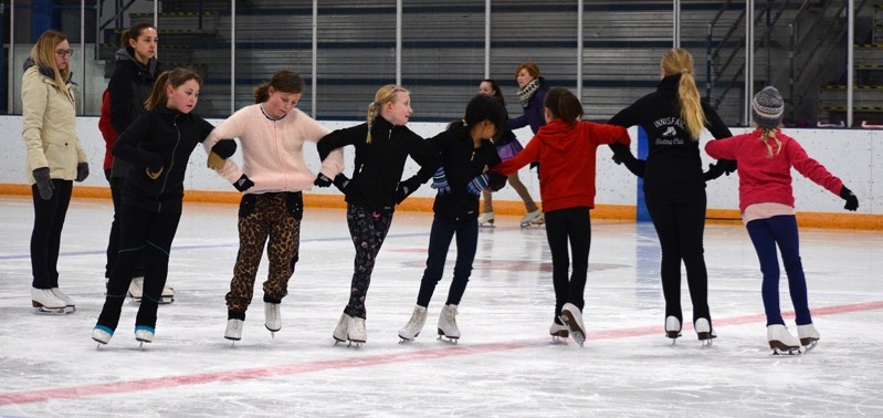 Members of the Innisfail Skating Club rehearse a number for their upcoming annual skating show at the Innisfail Arena on March 18.