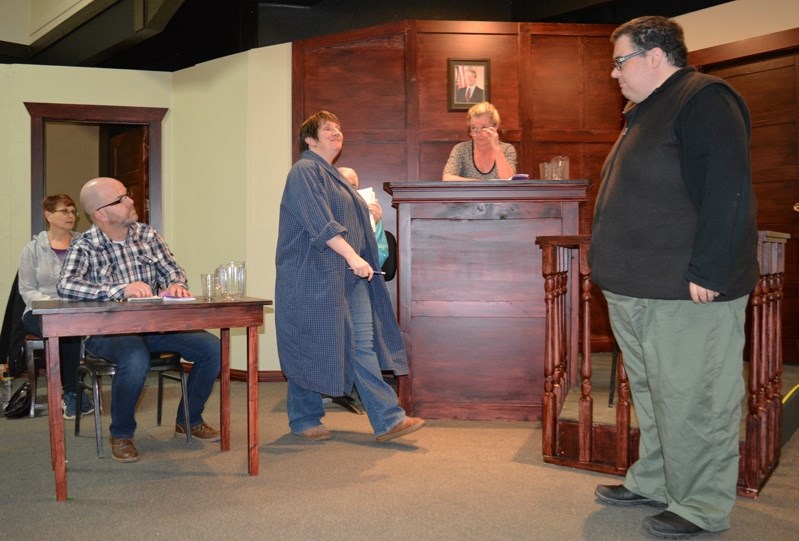 Performers with Innisfail Town Theatre rehearse a scene from their spring production Nuts. The courtroom drama runs April 19 to May 5 at the Ol&#8217; Moose Hall.