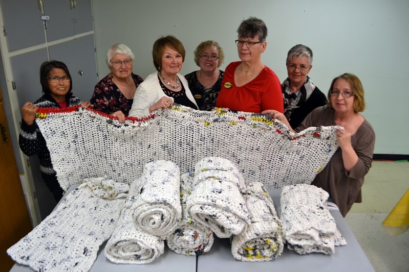 The ladies of Innisfail&#8217;s Plarning Project. Eileen Reid, coordinator of the Innisfail Seniors Drop-In Centre (centre-left front) and Roberta Driver (centre-right