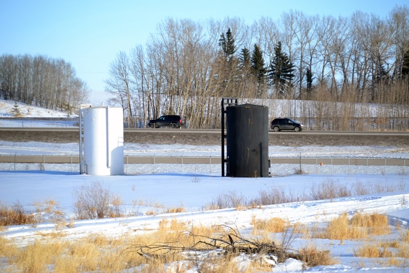 Willowridge Road residents in the deep southeast section of town live directly across the road from two large tanks on land that was the subject of passionate debate at town