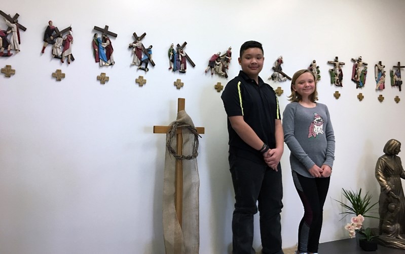 Students and staff at St. Marguerite Bourgeoys Catholic School prepare for Easter through Lent. From left to right are Grade 6 students Kirk Cabantan and Olivia Nichols.