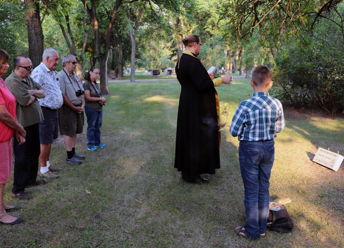  Family members at the Blessing of the Grave service for Walter Kravcenko.