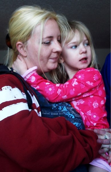 Brooke Aubuchon at home with her mother Robin Brand. They are going back to New York City on Feb. 19 for potentially life-saving surgery.