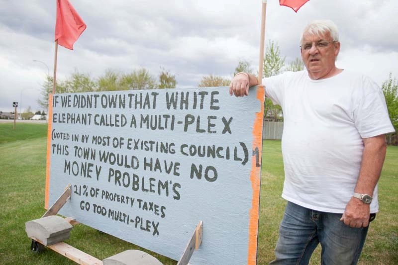 Activist Ken McCarthy says he only started naming names on his yard sign after being attacked on Facebook.