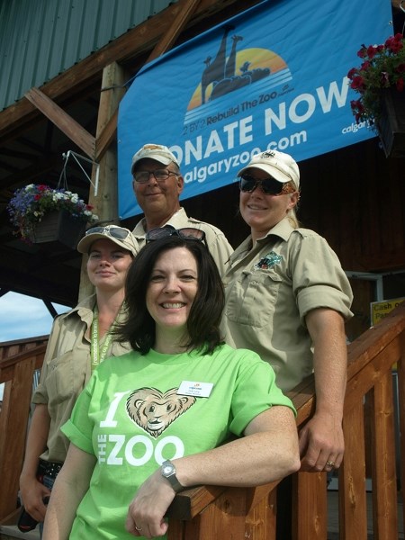 Judy Lang, manager of marketing at the Calgary Zoo (front), was at Innisfail&#8217;s Discovery Wildlife Park (DWP) July 20 as the local zoo hosted a fundraiser for the