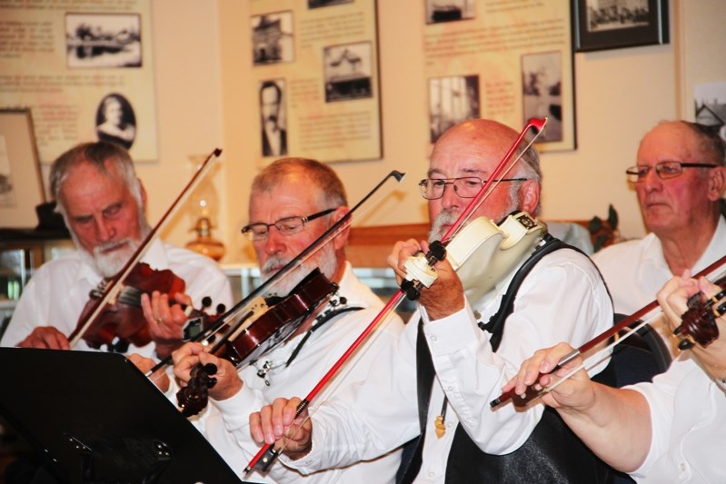 The Centennial Fiddlers preformed at the Fall Festival at the Innisfail and District Historical Village.