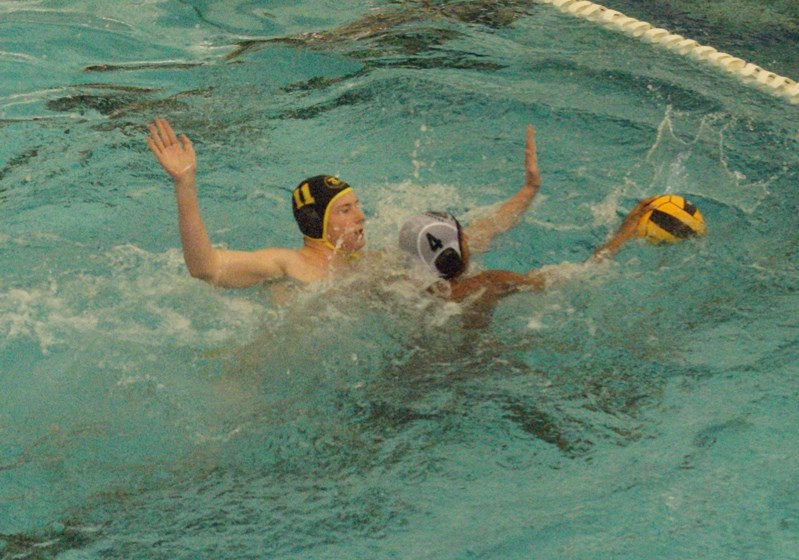 Quinn Layden (left), 16, a former member of the Innisfail Hurricanes, won two gold medals this year while palying for the Calgary Torpedoes.