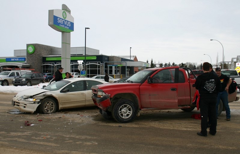 RCMP respond to an accident at the corner of 45 Ave. and 50 St. Dec. 20. Emergency services were called, but no injuries were reported.