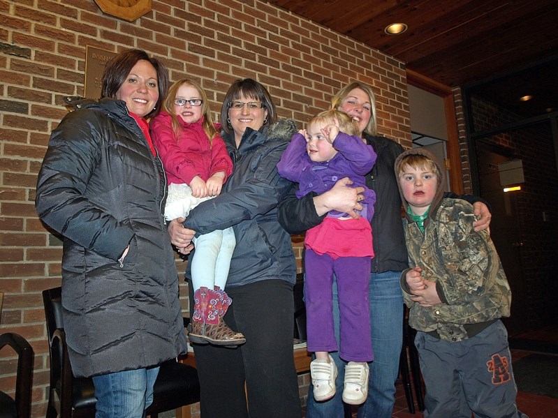 Children and members of the sub-committee of the Ecole John Wilson Parent Council Society rejoice after the Feb. 24 town council meeting where a $10,000 contribution was