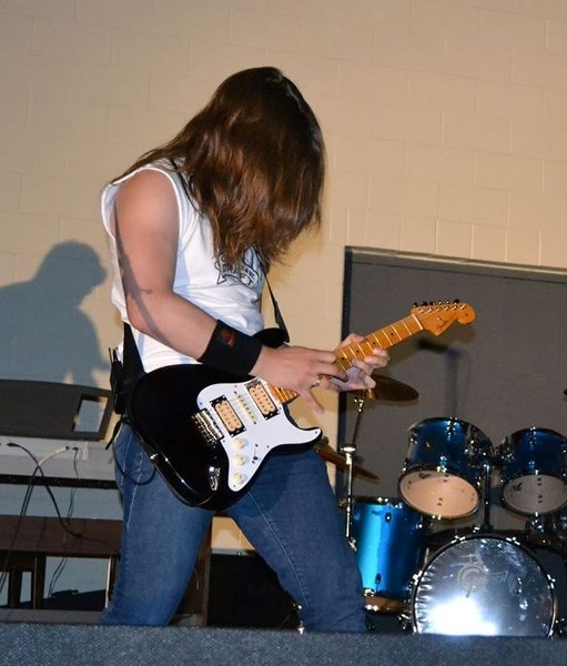 Alex Grimberg, 17, plays his electric guitar in the music room at Innisfail Jr/Sr High recently.