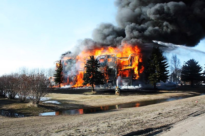 The fire at Wild Rose Manor was a raging inferno within minutes, quickly out of control from its highly flammable original cedar siding.