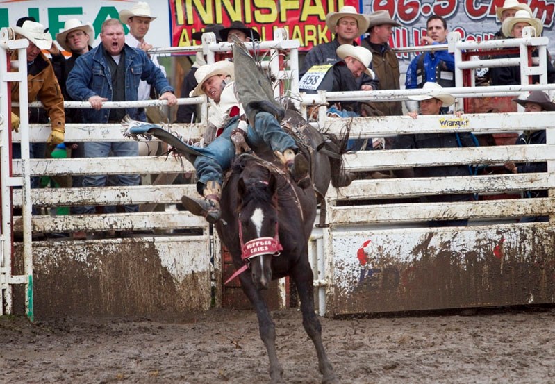 A cowboy rides bare back during the Daines pro rodeo on the weekend of June 13 to 15.