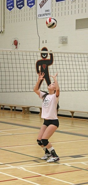 Sabrina Wachter practises setting during the Senior High Girls volleyball tryouts on June 18 at the Innisfail Middle gymnasium.