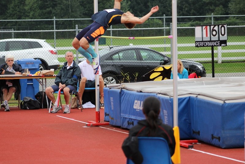 Brayden Posyluznuy (right) flops over a high jumps during the Royal Canadian Legion Youth Track and Field Championships the weekend of Aug. 15 to 17.