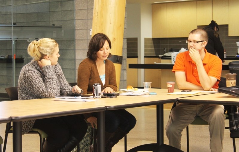 Ley-Anne Mountain (centre) of Naturally Nurtered speaks about her animal centred therapy sessions which run in schools around Innisfail and area during the Sept. 11 Community 