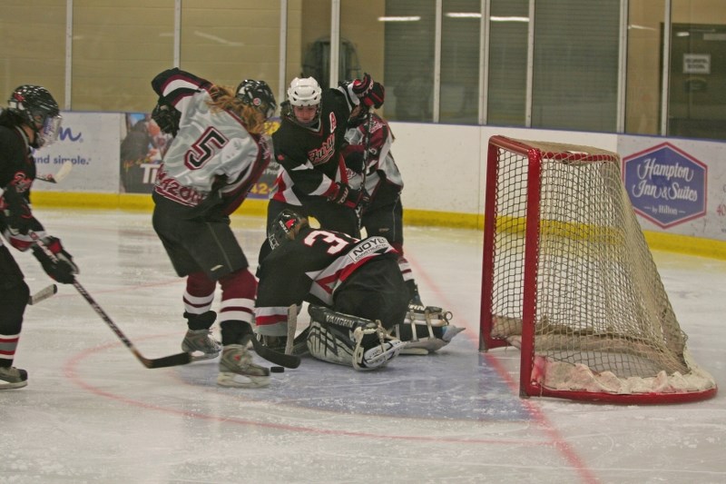 Central Alberta Amazons hockey action during last years playoffs. The Amazons won a silver medal for the third consecutive year and are playing for top spot in 2014-15.