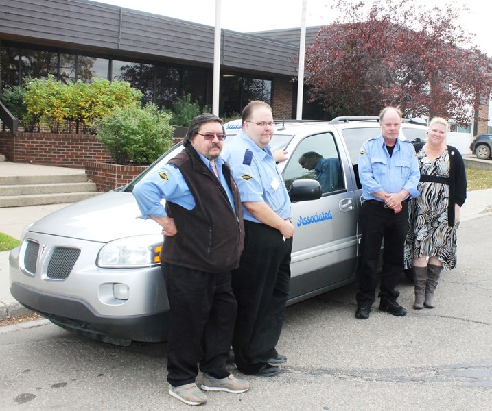 Innisfail&#8217;s newest taxi drivers Tony Thibert, Richard Atkinson, Clark Slauenwhite and Lori Tetteh anxiously await their first day of work, tentatively scheduled for