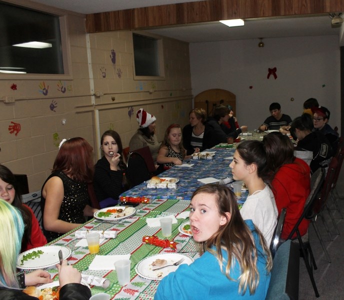 More than 20 youth attended the first Boys and Girls Club and Side Door Program Christmas dinner on Dec.17 at the Innisfail Youth Programming Facility.