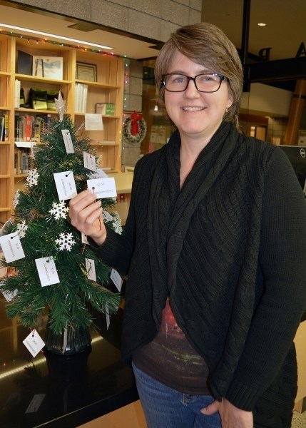 Melinda Mercer, youth and adult programmer at the Innisfail Library/Learning Centre, is encouraging everyone to pay it forward this Christmas season.