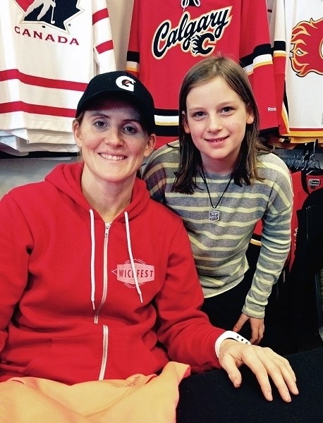 Megan Graham, right, was one of several girls from the Innisfail Flyers hockey club to participate in Wickfest in Calgary Nov. 26 to 29, an event hosted and organized by