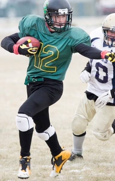 A Bowden Blazers player attempts to get past a Caroline Cougars player during the team&#8217;s game at Bowden Grandview School last fall.