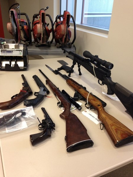 Guns seized in the joint recent RCMP and Calgary Police service takedown of three suspects from an organized crime trafficking operation that has been operating in Calgary