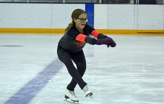 Brooke Pike practises a spin during a practice session with the Innisfail Figure Skating Club.