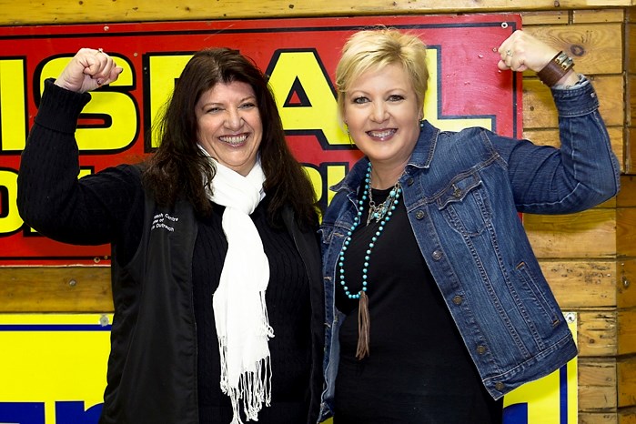 Innisfail&#8217;s Dusty Daines (right) and Barb Barber, executive director of Women&#8217;s Outreach, at the Feb. 18 fundraiser. Daines raised tens of thousands of dollars