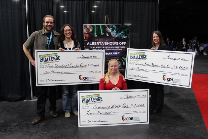 Serena Bos, head zookeeper at Innisfail&#8217;s Discovery Wildlife Park (centre) accepts a cheque for $4,000 for the zoo&#8217;s third-place result at last week&#8217;s