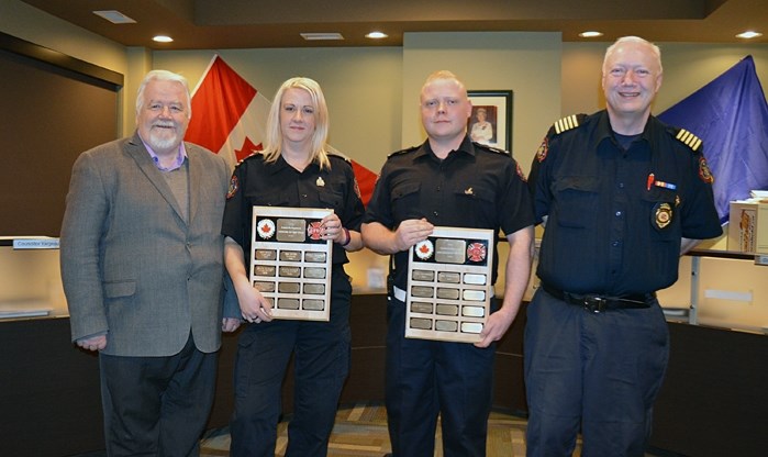 The Penhold Fire Department recently presented its annual awards at a council meeting on Feb. 22. Firefighter of the year was awarded to Jamie Southwell, right centre, and