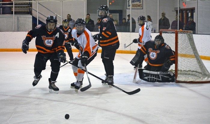 The Innisfail Midget A Flyers in quarter-final action against the Medicine Hat Hounds in Game 1 on Feb. 20. The Flyers won the best- of-three series 2-0 and face Chestermere