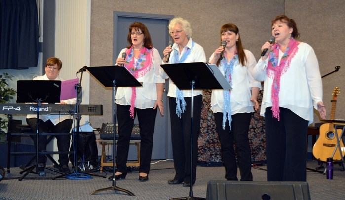 The singing group, Joy Abounds, was one of three to entertain guests during a fundraising concert and event called Sharing Our World, at the Innisfail Royal Canadian Legion