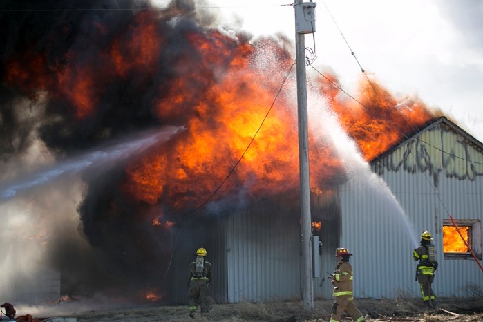 Olds, Didsbury and Carstairs and fire departments battle a blaze at River Rock Custom Processing just south of Didsbury on Rge. Rd. 20 on the afternoon of March 15.