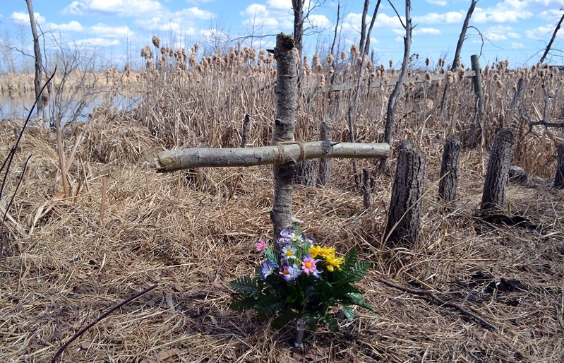 Darren Demkiw, 39, the younger brother of Dwayne, erected a simple cross and placed flowers at the site where his sibling&#8217;s remains were discovered on April 5. Darren,