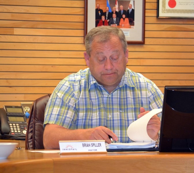 Mayor Brian Spiller at town council last week. He was relieved the April 14 provincial budget did not cut MSI grant money, funds the town needs for major capital projects.