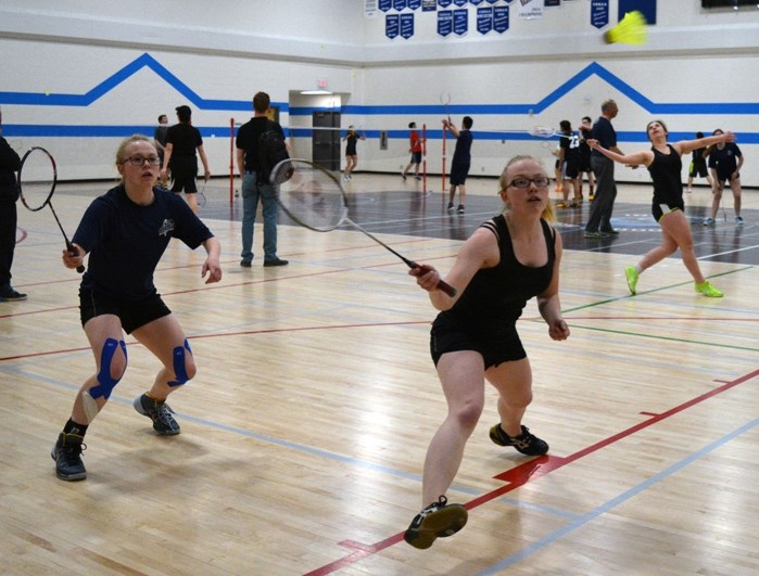 Twin sisters Elizabeth (left), and Rebekah Maciborski are seen here during a recent badminton practice at Innisfail High School. They were two of several players to win a