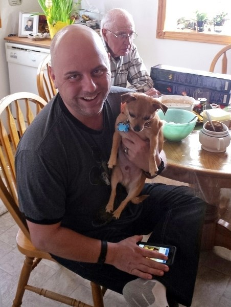 The late Dwayne Demkiw during a past visit with his grandparents.