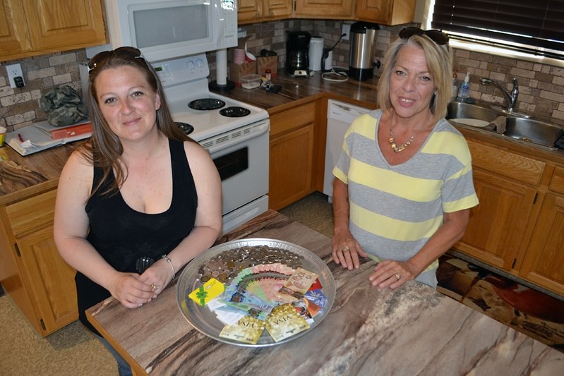 Deanna Campbell, treasurer for the The Loft Society (right), and Darcy McAuley, the agency&#8217;s facilitator, at their headquarters in Innisfail, which will soon turn into