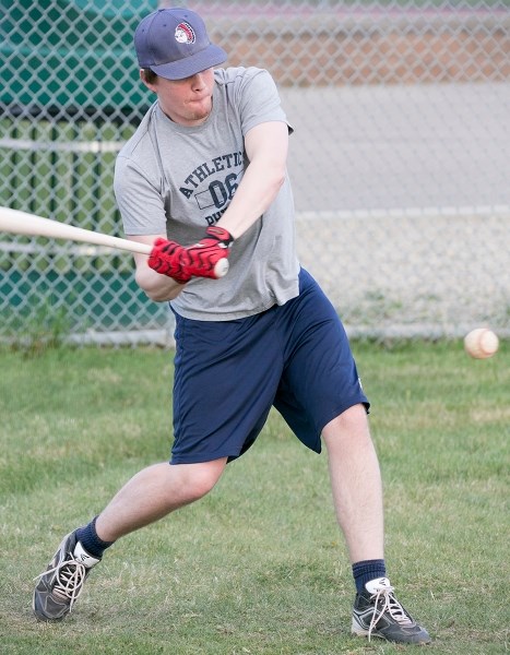 Innisfail Indians player Riley Elliott swings at the ball during batting practice at the baseball fields behind the Innisfail Aquatic Centre on May 4.