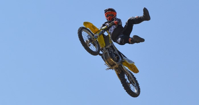 Freestyle motocross rider Lance McMorran jumps into the air during a fundraising event for the Red Cross and Fort McMurray wildfire relief efforts.