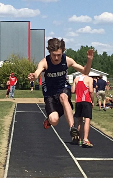 Innisfail High School student Nathan Armstrong competes in the long jump event on May 18 in Red Deer.