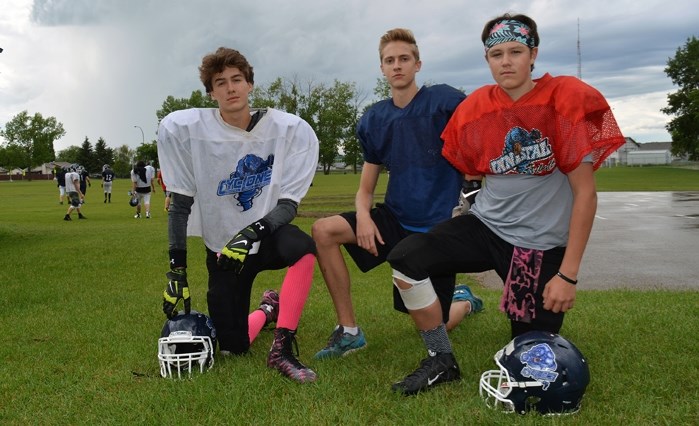 Three local teens recently made the Zone 4 football team and will represent the region at the 2016 Alberta Summer Games July 14 to 17 in Leduc. From left are Jaidon Wright,