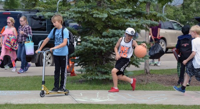 Students at Innisfail Middle School were jubilant as they finished classes for the summer on June 28, along with those from école John Wilson Elementary School and St.