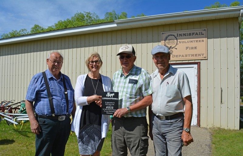 One of the historical buildings at the Innisfail and District Historical Village had its roof repaired this spring thanks to a $1,200 donation from EQUS. Village board